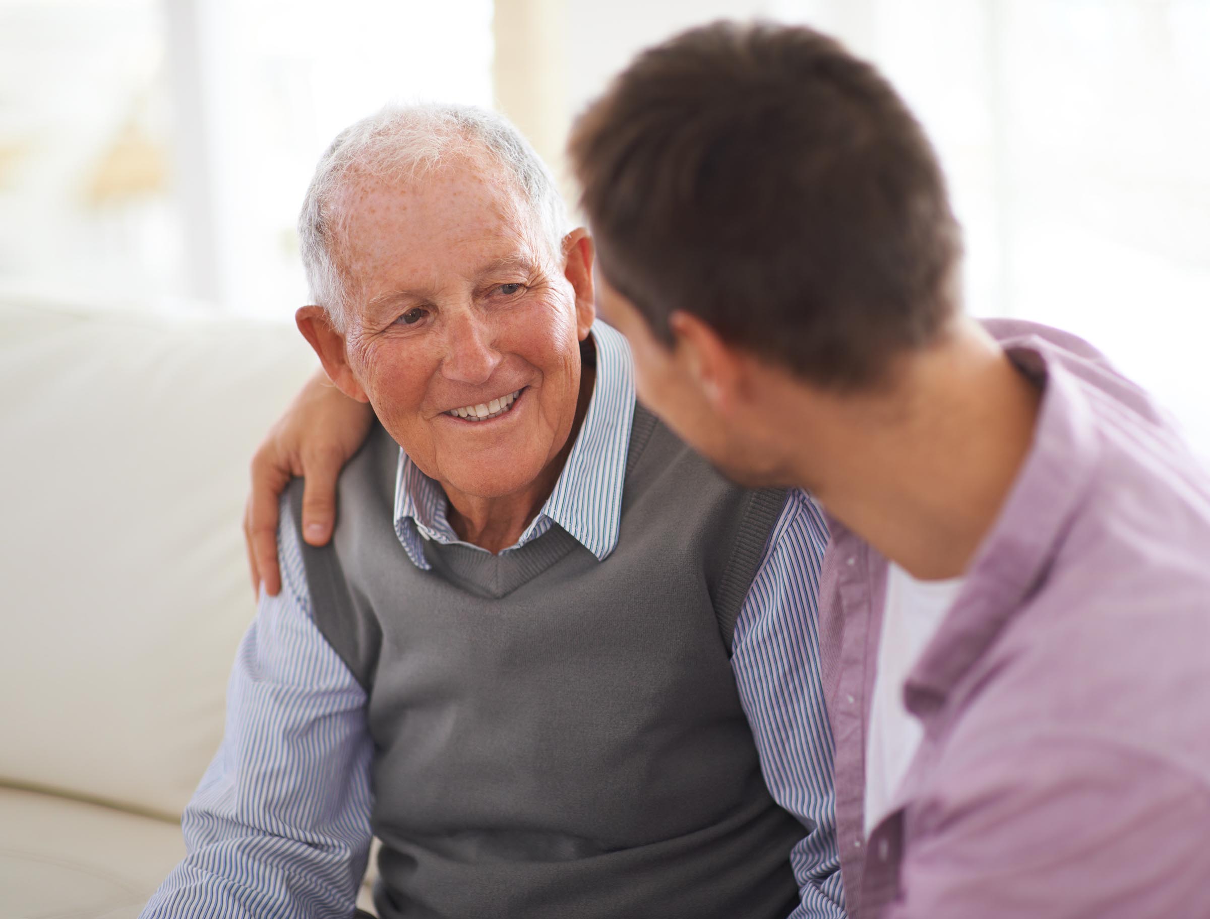 Senior father with adult son